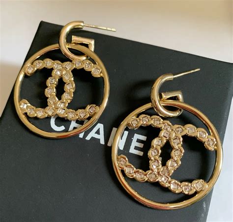 chanel cc gold hoop earrings|Chanel hoop earrings price.